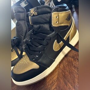 Nike Black and Gold High-Top Sneakers